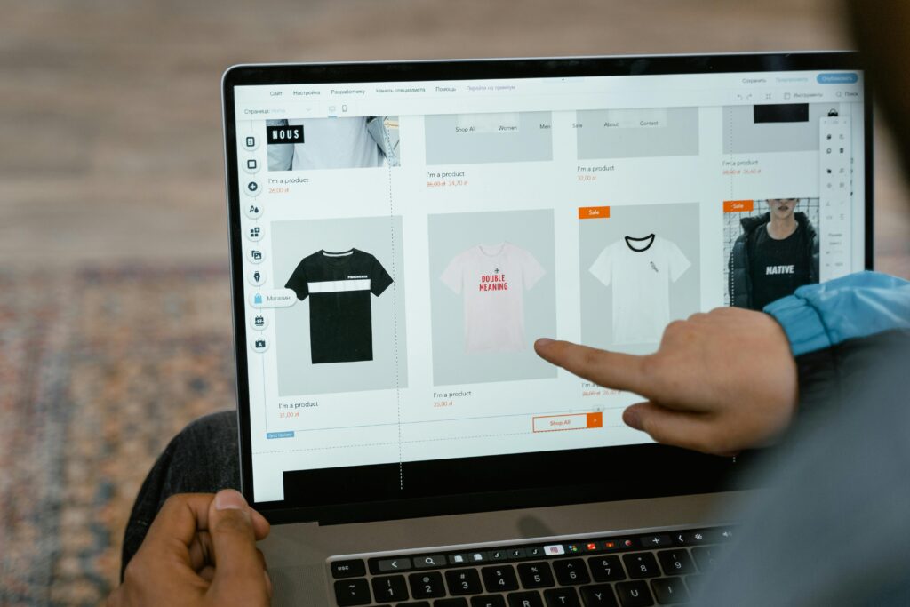Laptop screen showing t-shirt and other products on a trusted online shopping website in India